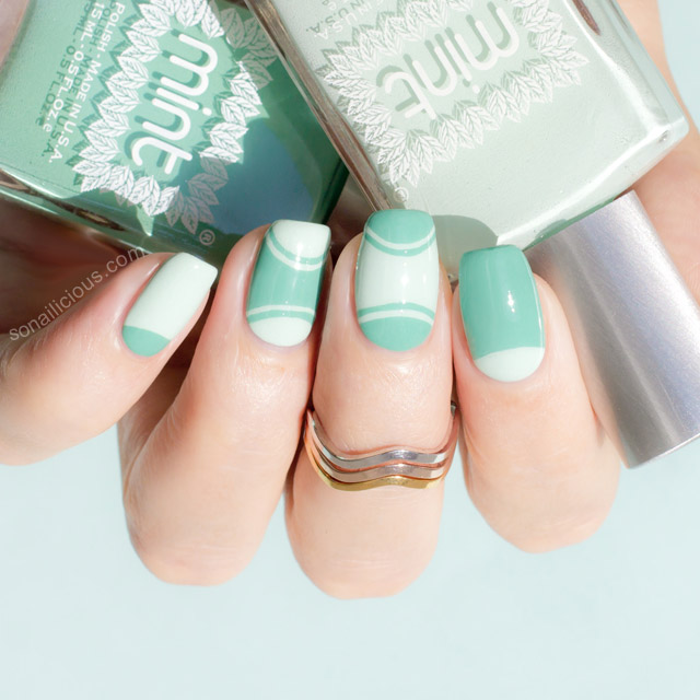 Outlined half moon mint manicure