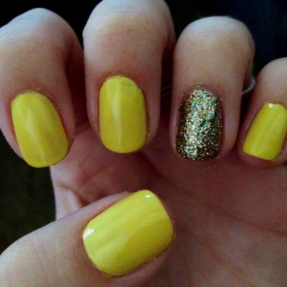 Bright yellow with a gold and green glitter accent