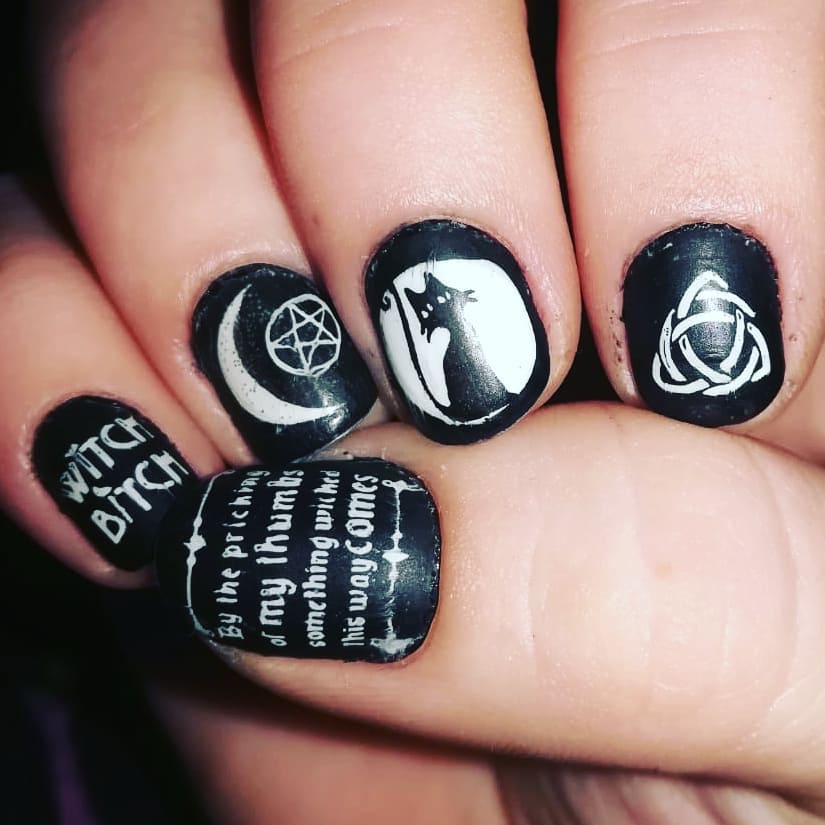 Beautiful Black Nails with Cat Moon and Quote Printed Nail Art Design