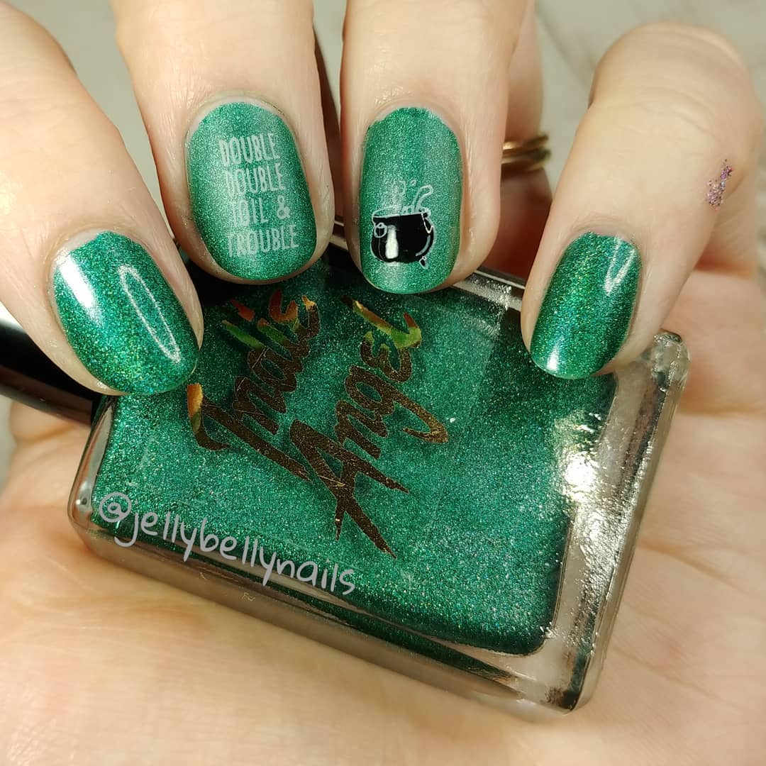 Shimmery Green Nails with Quote Nail Art for Halloween