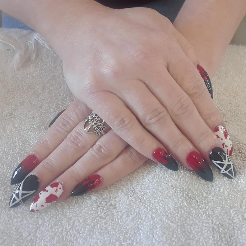 Stiletto Nails with Black and Red Spider Web Design Nail Art