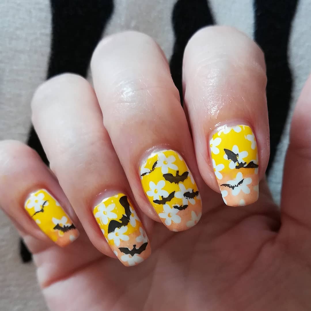 Yellow Floral Design Nail Art with Bats Design for Long Square Nails