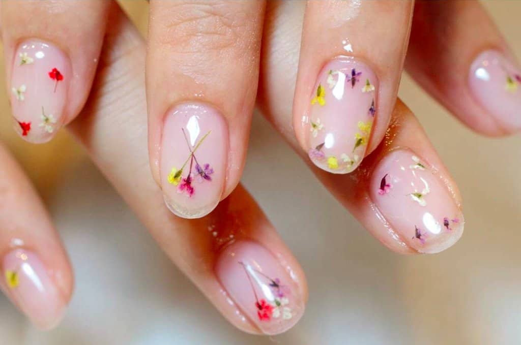 Tiny pressed spring flower manicure