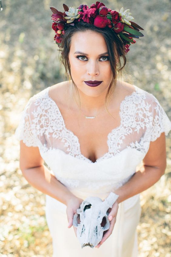 add a bit of edge to your bridal look with a trendy braided hairstyle and an almost black bridal lip