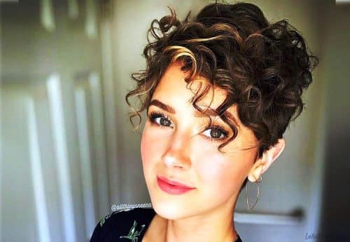 Curly pixie hair cut with bangs