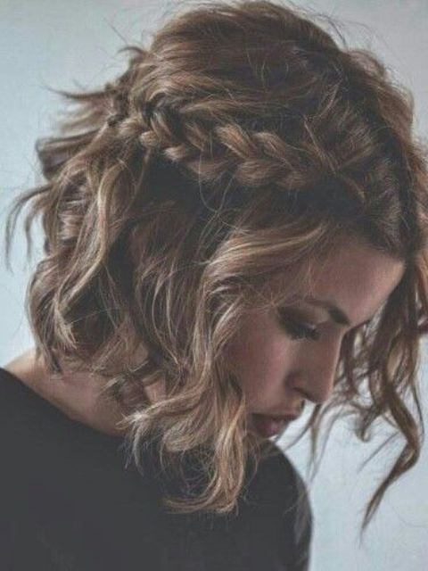 a layered half updo with a large one side braid and hair down is a non-typical option