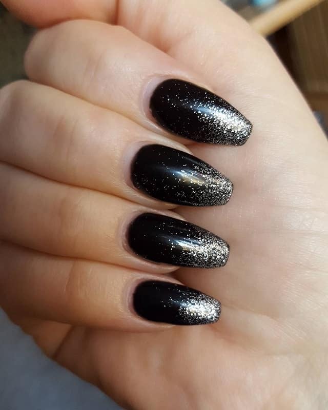 black nails with silver tips