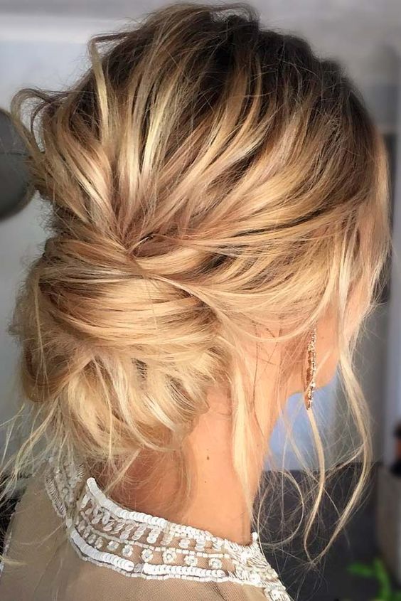 a simple twisted side updo with a volume on top and some locks down is a timeless idea
