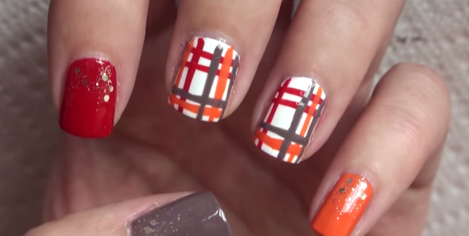 Plaid red orange nail art