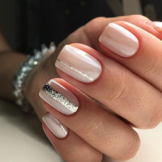 ombre French nails with some rhinestones for a glam feel and a bold look