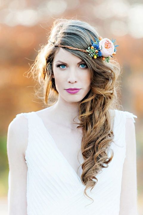 perfect side swept curly hair will look amazing for any wedding style