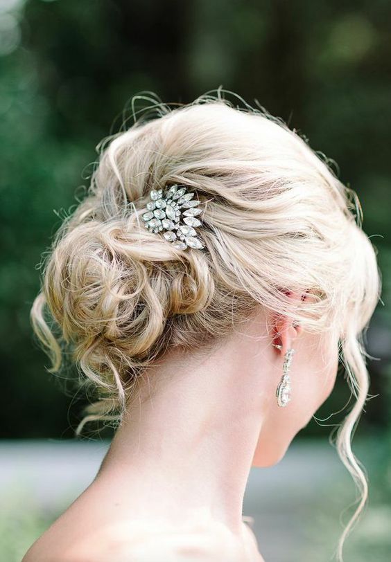 braided low side updo looks gorgeous and fits a lot of wedding styles