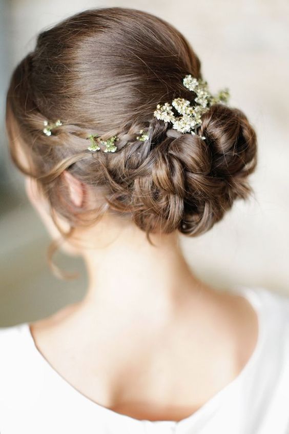 bridal wavy updo with fresh green leaves
