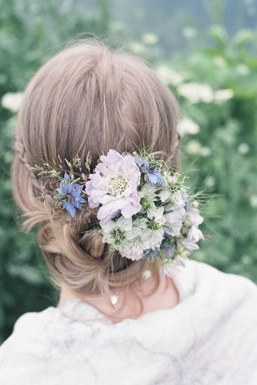 blush flowers and leaves for a cool twisted wedding updo