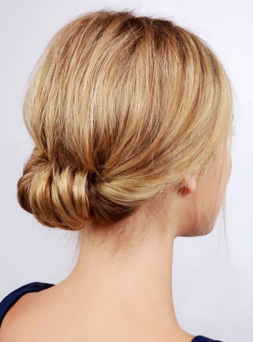 a textural braided updo with lots of hair up and a dimensional top is a creative idea with a boho feel
