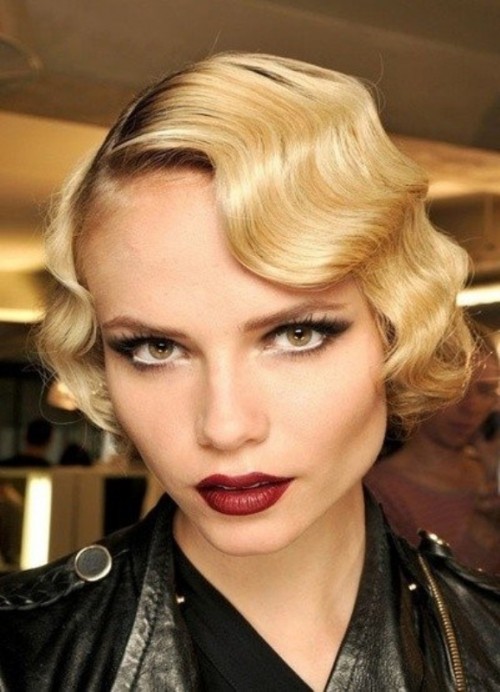a classic Hollywood wave accenting long dark hair looks chic and bold and never goes out of style