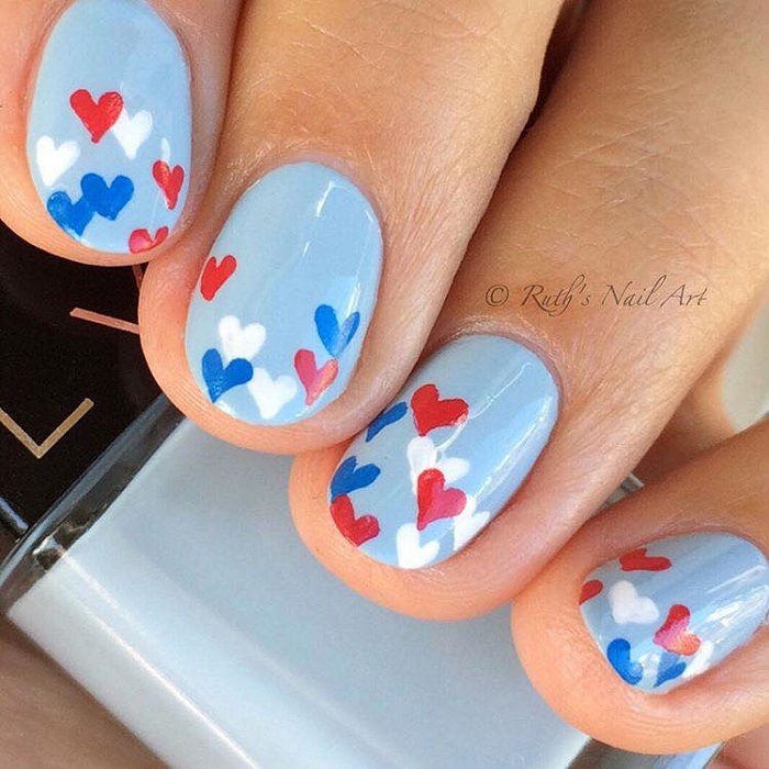 4th Of July Nail Inspo to Celebrate Independence Day with Style blue nails hearts