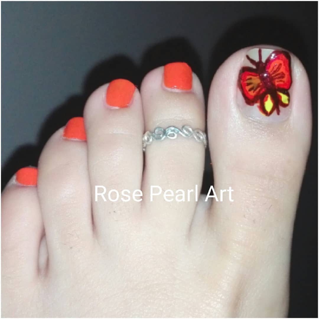 Butterfly Design Toe Nail Art with Orange Nails