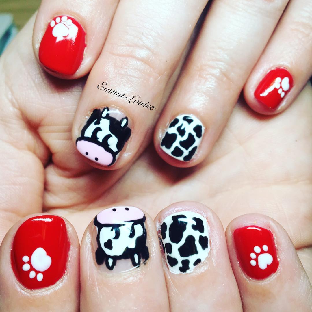 Stunning Red and Cow Design Nail Art with Paw