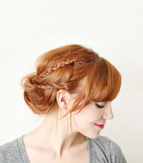 an updo with a colorful braid on top and bangs will add a touch of color to your look