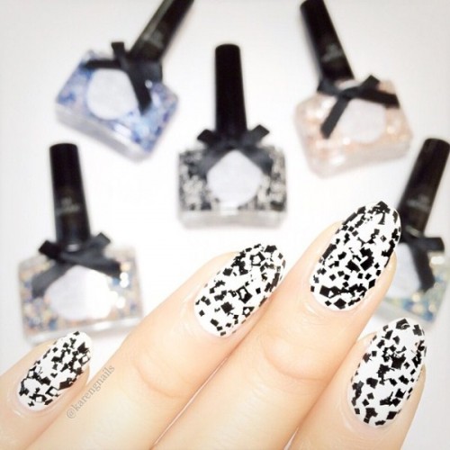 grey and white nails with geometric decor are neutral enough but have a special touch on them