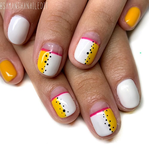 Cutest White and Yellow Nail Art with Black Dotted Design