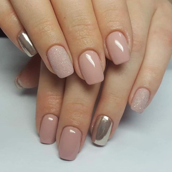 a white manicure with a gold glitter accent nail is a timeless and stylish idea to rock for a winter or other bridal look
