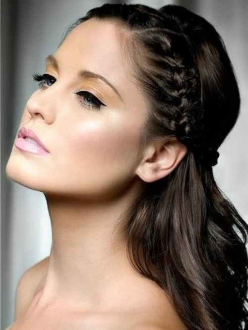 a low updo with several braids and much dimension is a proper idea for long hair