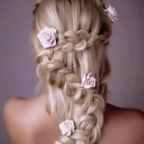 a wavy half updo with several braids is a great idea for long hair, with much dimension and eye-catchiness