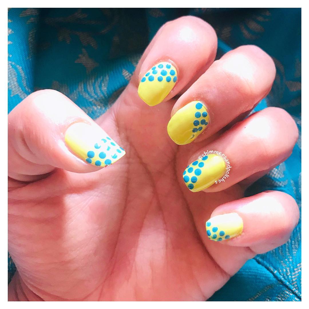 Yellow Nails with Blue Dotted Nail Art