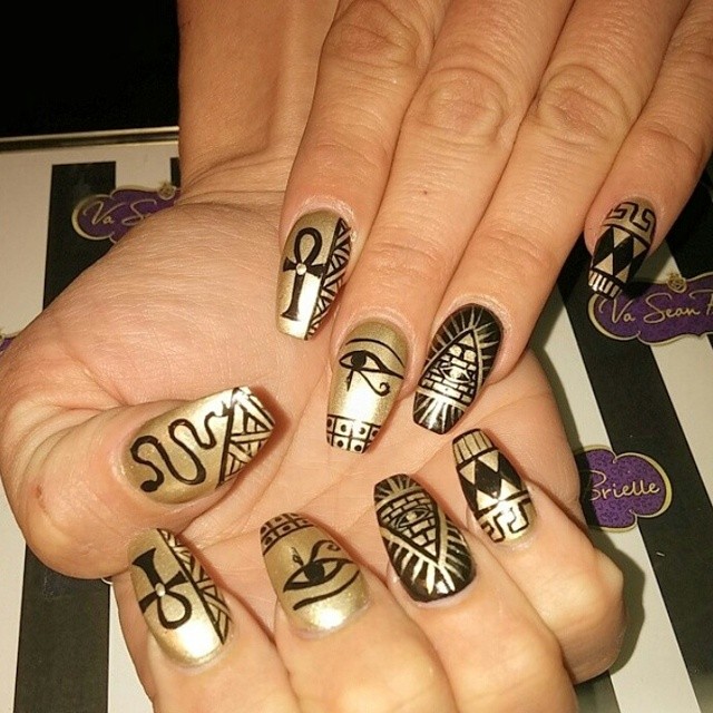 Awesome Golden Nails with Black Nail Art Design