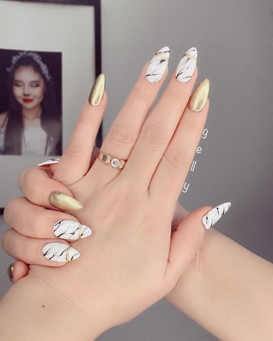 White Nails with Exceptional Golden Nails