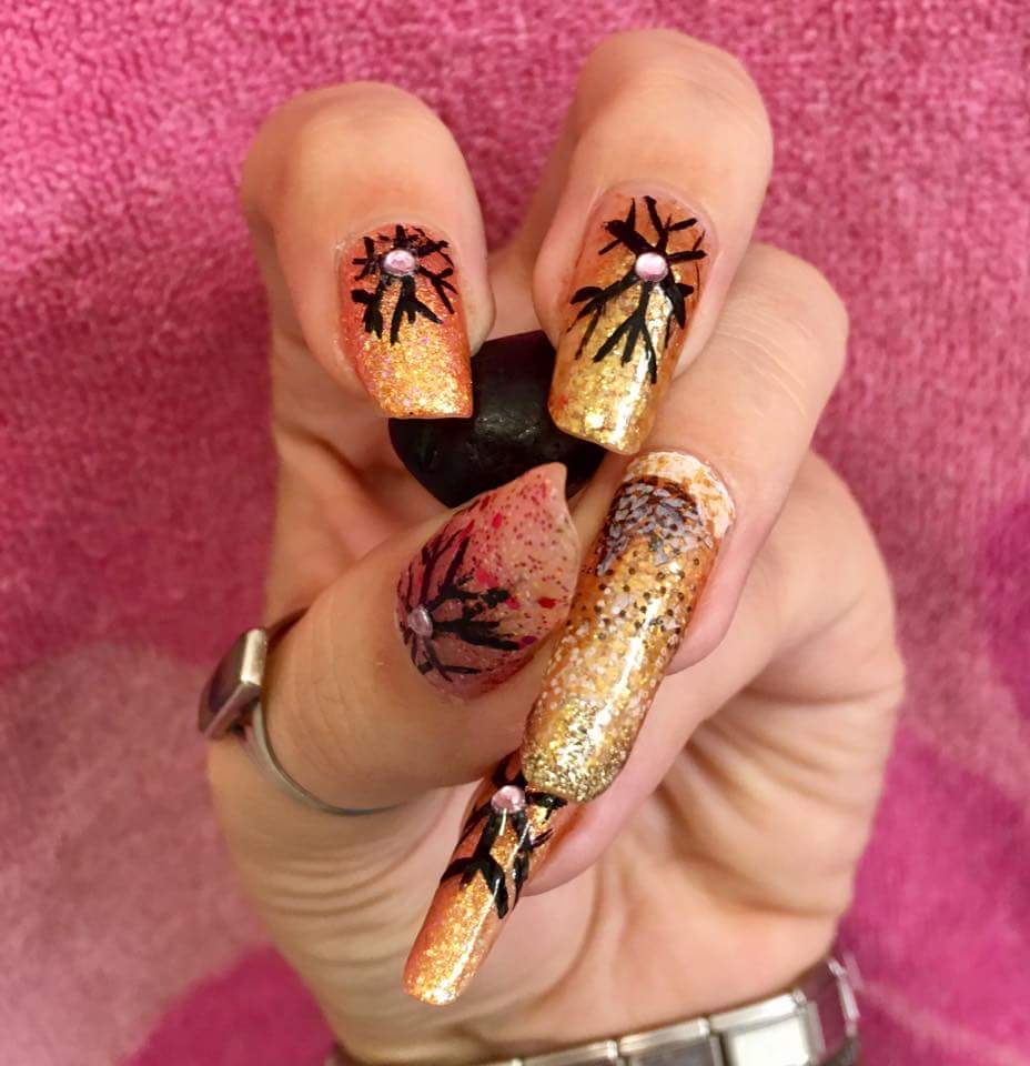 Black Snowflake and Long Gold Glitter Witch Holiday Nail Art for Halloween
