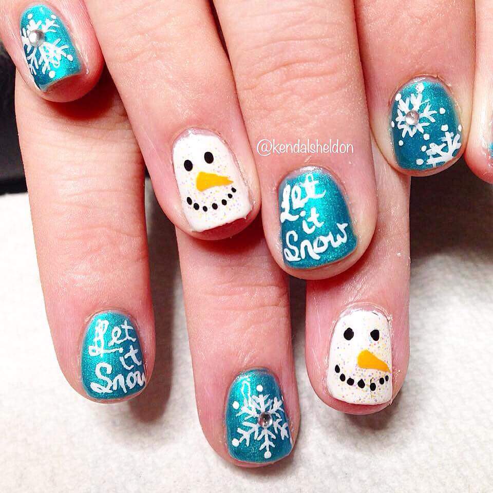 Snow Flakes and Snow Man Christmas Holiday Nail Art In White and Metallic Light Blue For Short Square Nails