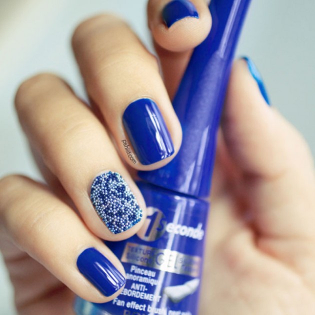 Blue with a caviar accent nail