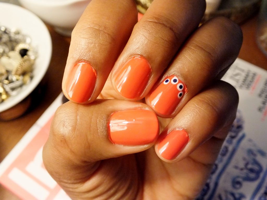 Orange with white and blue dots