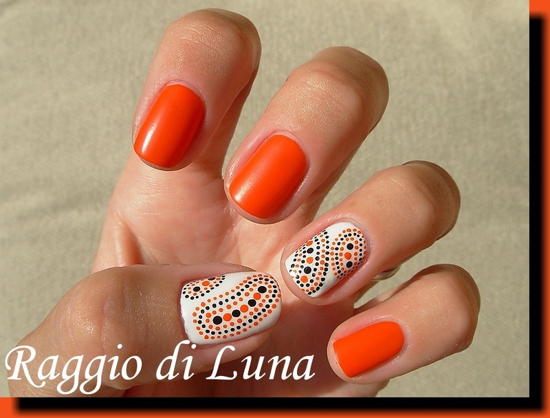 Orange, white, and black abstract dots