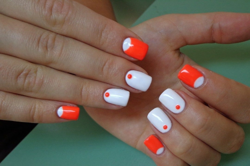 Orange and white dots and half moons