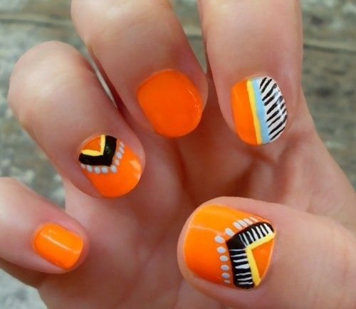 Orange tribal nails