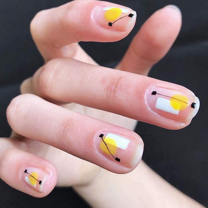 Upgrade-Your-Mani-With-These-Negative-Space-Nail-Art-Ideas-geometric