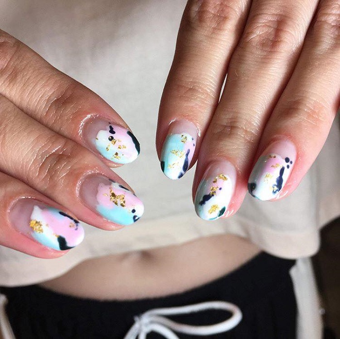 Upgrade-Your-Mani-With-These-Negative-Space-Nail-Art-Ideas-pastels gold white black